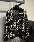 BLACK CIRCUS CARDIGAN
